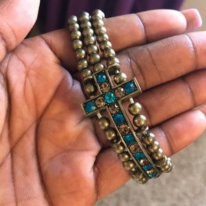 Gold and blue cross bracelet